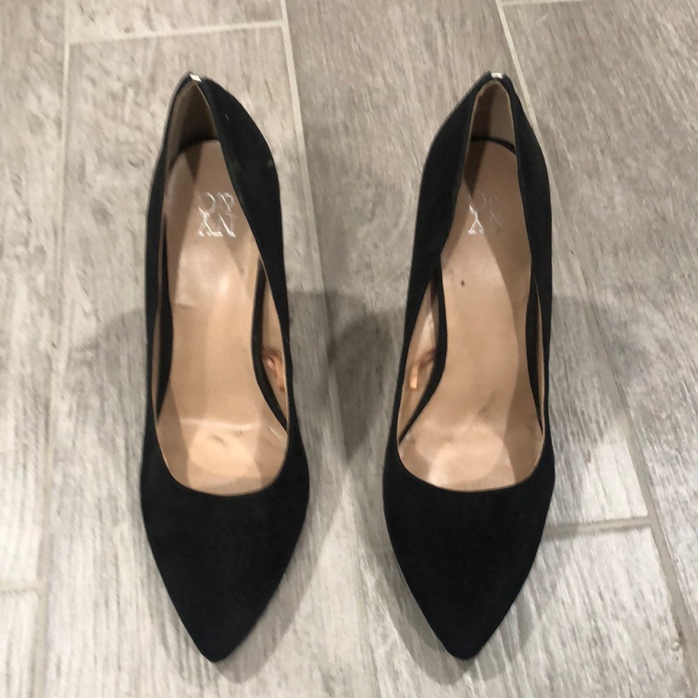 Worn black heels